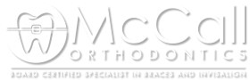 McCall Orthodontics Logo White Version