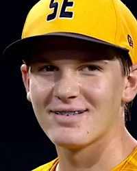 Boy In Baseball Cap With Braces