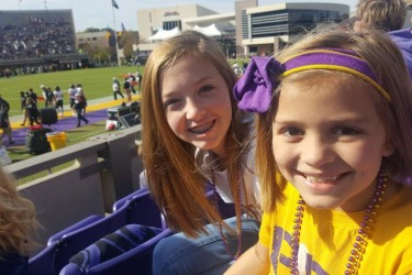 Girls At Sporting Event With Braces
