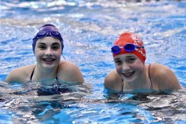 Girls In Swim Caps And Braces