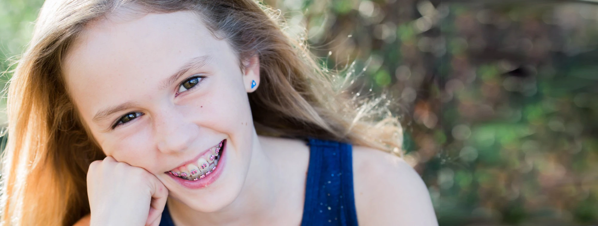 Happy Patient Girl In Blue Dress Smiling